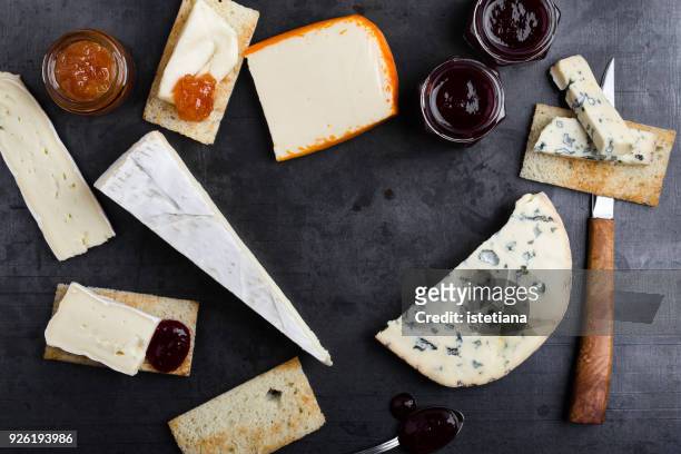 various types of french cheese with jam - ブリーチーズ ストックフォトと画像