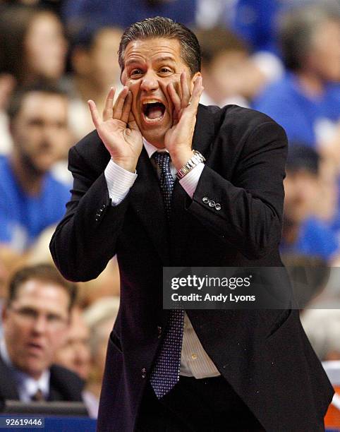 John Calipari the Head Coach of the Kentucky Wildcats gives instructions to his team during the game against the Campbellsville University Tigers at...