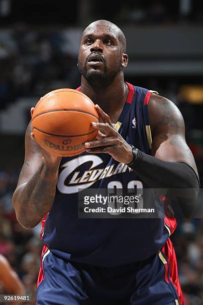 Shaquille O'Neal of the Cleveland Cavaliers shoots a free throw during the game against the Minnesota Timberwolves on October 30, 2009 at the Target...
