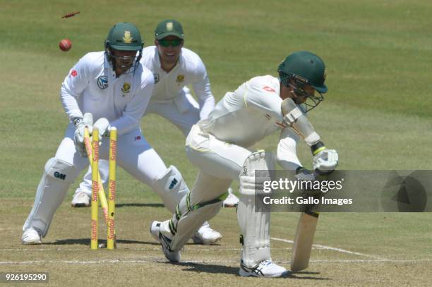 Mitchell Starc of Australia bowled by Keshav Maharaj of the Proteas during day 2 of the 1st Sunfoil Test match between South Africa and Australia at...