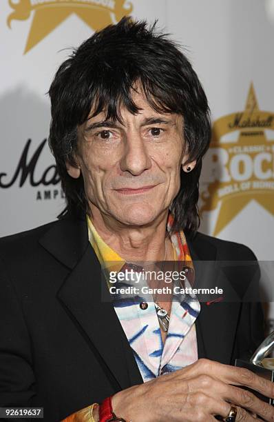 Ronnie Wood from the rock group the Rolling Stones with his Outstanding Contribution award during the Classic Rock Roll Of Honour Awards at the Park...