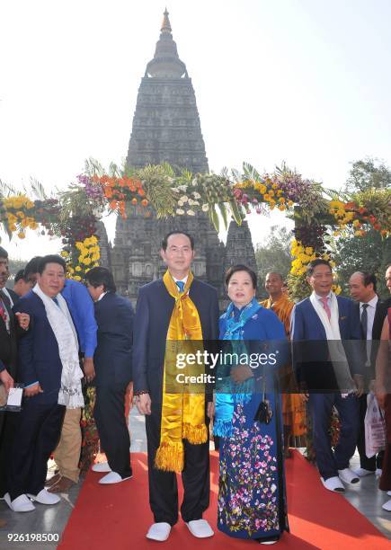 Vietnam's President Tran Dai Quang and his wife ?Nguyen Thi Hien visit the Mahabodhi temple, a UNESCO World Heritage Site and important pilgrimage...