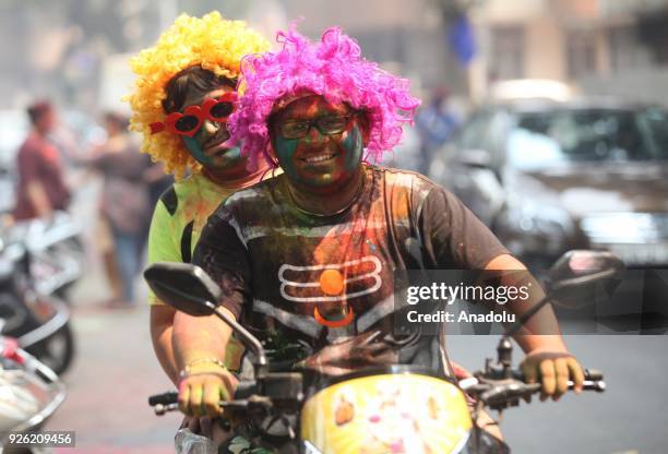Indian men's faces are smeared in color as they celebrate Holi, the Hindu festival of colors, in Mumbai, India on March 02, 2018. The festival, a...