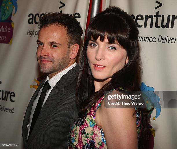 Jonny Lee Miller and Michelle Hicks walk the red carpet at the 10th Anniversary celebration of Only Make Believe at the Shubert Theatre on November...