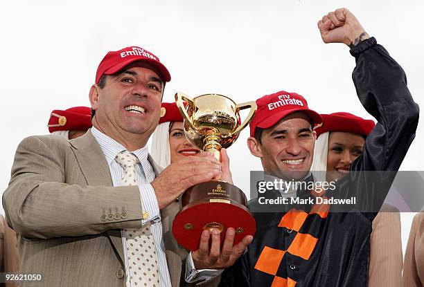 Trainer Mark Kavanagh and Jockey Corey Brown celebrate with the Cup after Shocking won the Emirates Melbourne Cup during the 2009 Melbourne Cup Day...