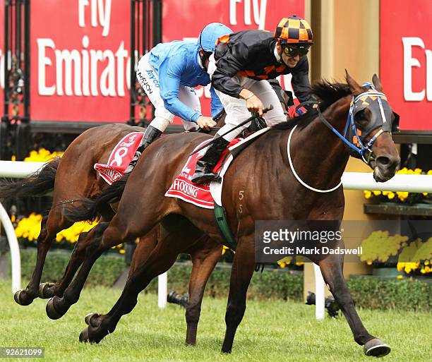 Jockey Corey Brown riding Shocking wins the 2009 Emirates Melbourne Cup during the 2009 Melbourne Cup Day meeting at Flemington Racecourse on...