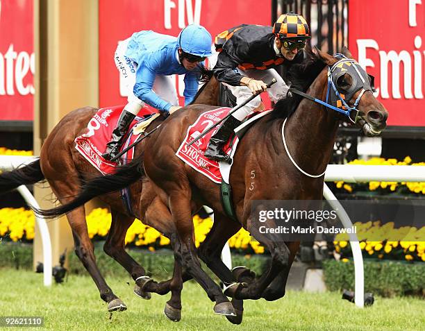 Jockey Corey Brown riding Shocking wins the 2009 Emirates Melbourne Cup during the 2009 Melbourne Cup Day meeting at Flemington Racecourse on...