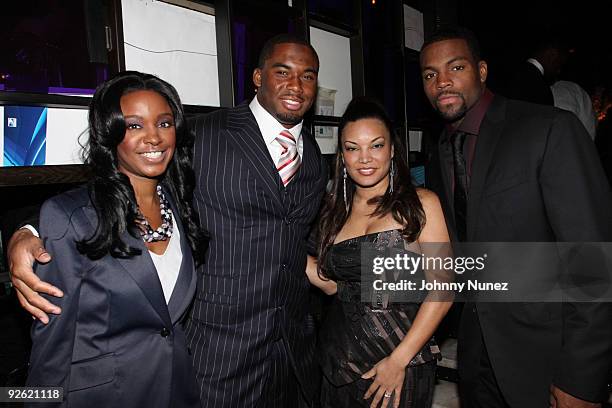 Dara McIntosh, Vernon Gholston, Egypt and Braylon Edwards attend the Kerry Rhodes Foundation black tie dinner at STK on November 2, 2009 in New York...