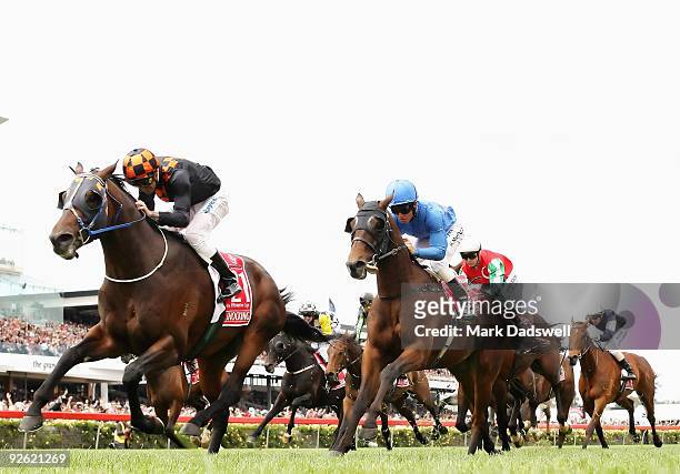 Jockey Corey Brown riding Shocking wins the 2009 Emirates Melbourne Cup during the 2009 Melbourne Cup Day meeting at Flemington Racecourse on...