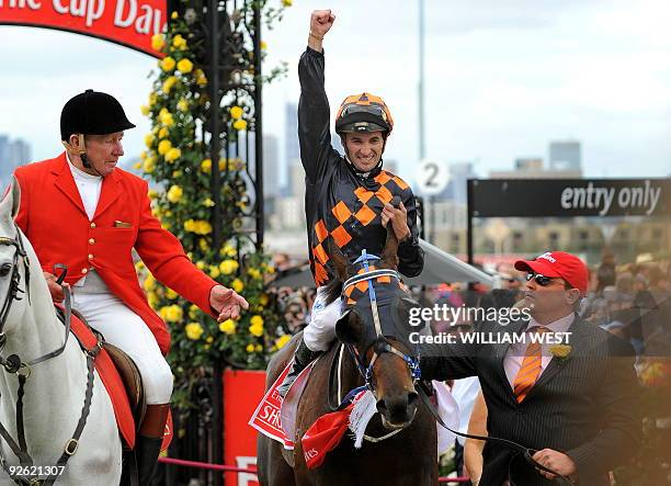 Jockey Corey Brown celebrates after winning the Melbourne Cup on his horse Shocking on November 3, 2009. Shocking denied international contenders...