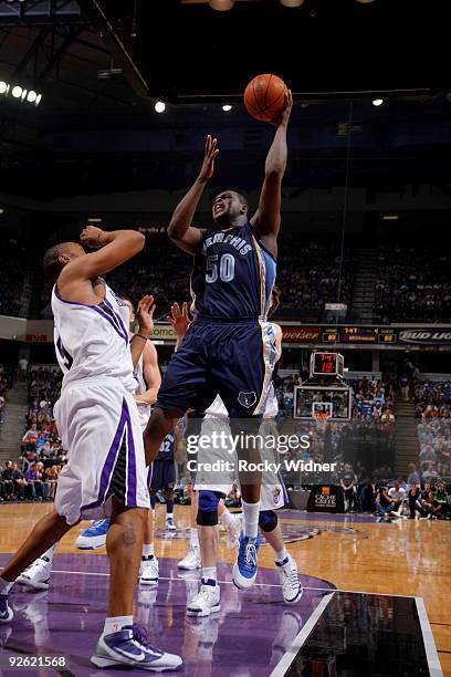 Zach Randolph of the Memphis Grizzlies shoots the ball over Kenny Thomas of the Sacramento Kings during the game on November 2, 2009 at ARCO Arena in...