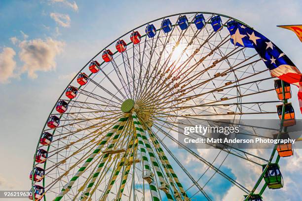 ferris wheel ride at state fair carnival - milwaukee wisconsin stock pictures, royalty-free photos & images