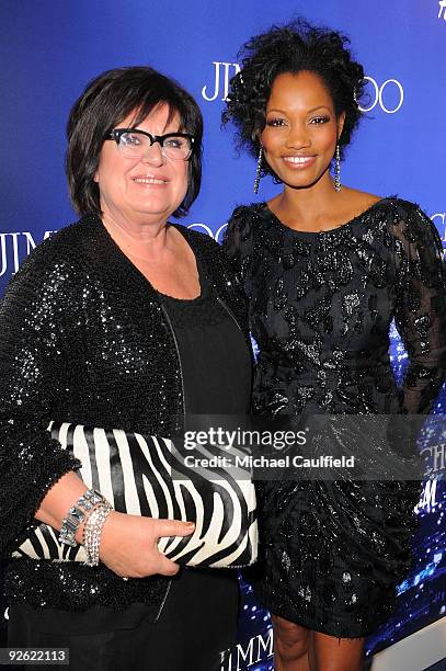 Creative Advisor Margareta van den Bosch and actress Garcelle Beauvais arrive at the Jimmy Choo for H&M Collection private event in support of the...