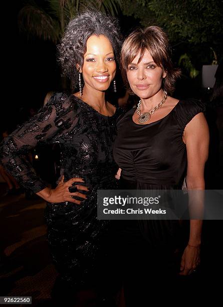 Actresses Garcelle Beauvais and Lisa Rinna attend the Jimmy Choo for H&M Collection private event in support of the Motion Picture & Television Fund...