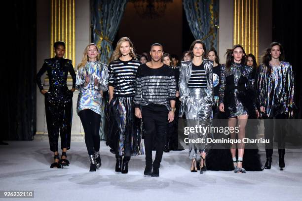 Designer Olivier Rousteing and models walk the runway during the Balmain show as part of the Paris Fashion Week Womenswear Fall/Winter 2018/2019 on...