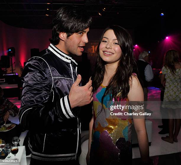 Actor Josh Peck and actress Miranda Cosgrove celebrate at her Sweet 16 Party at Siren on May 16, 2009 in Los Angeles, California.