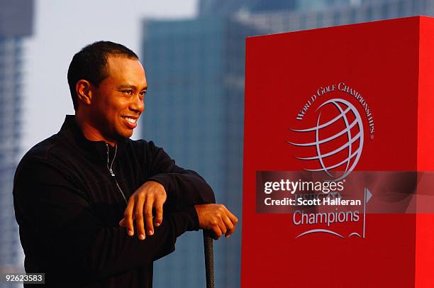 Tiger Woods of the USA waits on stage before hitting into the Huangpu River during the the Official 2009 WGC-HSBC Photocall at the Shanghai Port...