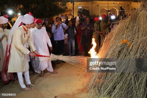 Maharaja of Royal family Padmanabh Singh torches a bonfire during 'Holika Dehan' at City Palace on the occasion of Holi Festival , in Jaipur,...