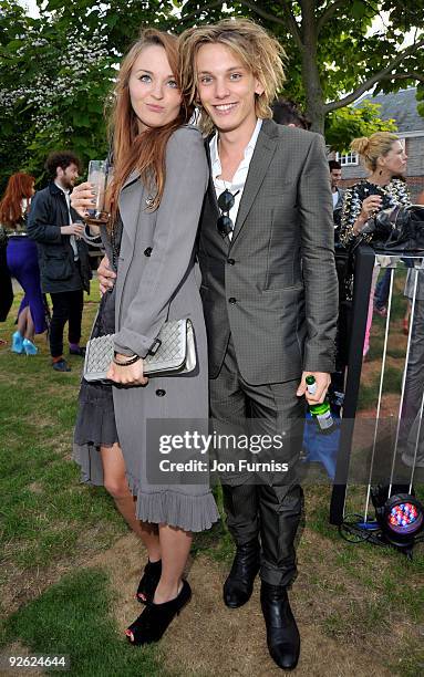 Jamie Campbell Bower and guest attend the annual summer party at The Serpentine Gallery on July 9, 2009 in London, England.