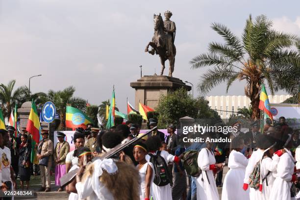 Ethiopians, wearing tradition clothes, attend an event to mark the 122nd Anniversary of Ethiopia's Battle of Adwa at King II Menelik Square in Addis...