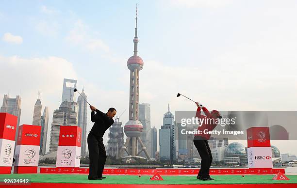 Tiger Woods of the USA and Sergio Garcia of Spain hit shots into the Huangpu River during the the Official 2009 WGC-HSBC Photocall at the Shanghai...