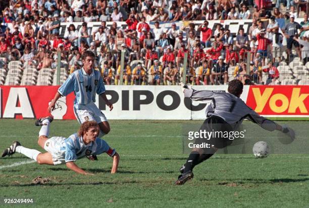 The goalie for the Argentinian soccer team goes for a ball in the South American under-17 soccer tournament, 21 March, 1999 in Montevideo Uruguay....