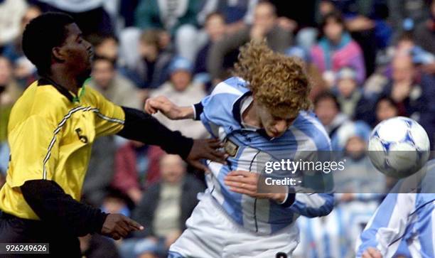 Fabricio Coloccini of Argentina, scores his team's first goal against Jamaica, during their group A game for the World Youth Soccer Championship at...