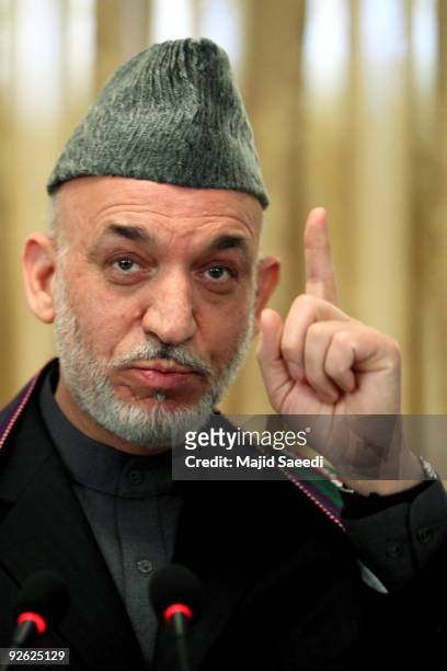 Afghan President Hamid Karzai addresses a press conference at the Presidential Palace on November 3, 2009 in Kabul, Afghanistan. Re-elected Karzai...