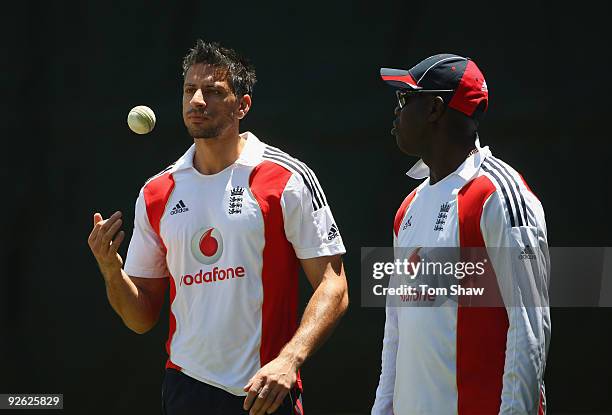 Sajid Mahmood of England looks on in the nets with bowling coach Otis Gibson during the England nets session at the Outsurance Oval on November 3,...