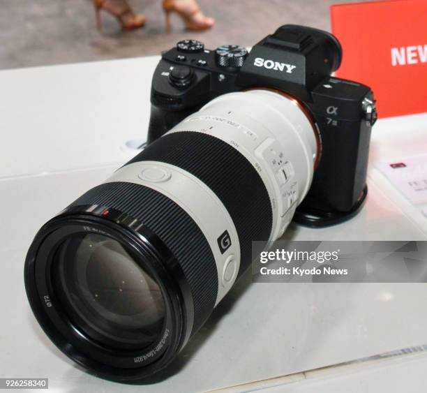 Photo taken on March 1 at a trade show in Yokohama, Japan, shows a Sony A7 III, part of a new range of mirrorless cameras. ==Kyodo