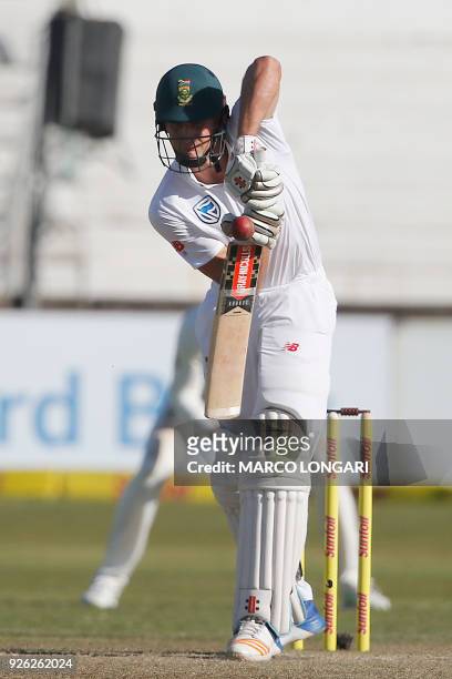 South Africa batsman Theunis de Bruyn hits the ball during day two of the first Test cricket match between South Africa and Australia at the...