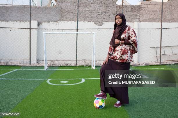 Somali football coach and player Marwa Mauled Abdi poses at the football ground of Ubah fitness center, the first football field exclusively opened...