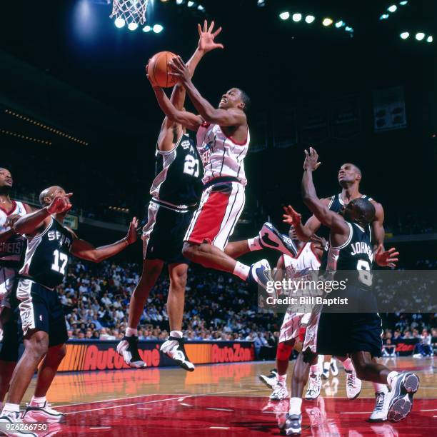 Steve Francis of the Houston Rockets shoots during a game played circa 2000 at the Compaq Center in Houston, Texas. NOTE TO USER: User expressly...