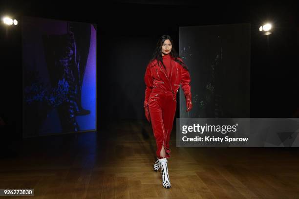 Model walks the runway during the Each x Other show as part of Paris Fashion Week Womenswear Fall/Winter 2018/2019 on March 2, 2018 in Paris, France.