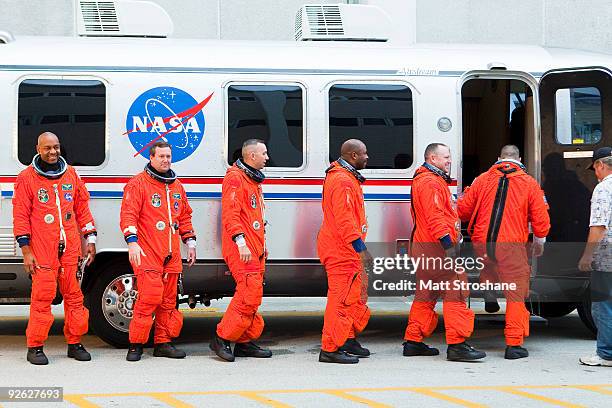 Space Shuttle Atlantis STS-129 mission astronauts Charlie Hobaugh, commander, Barry Wilmore, pilot, and mission specialists Leland Melvin, Randy...