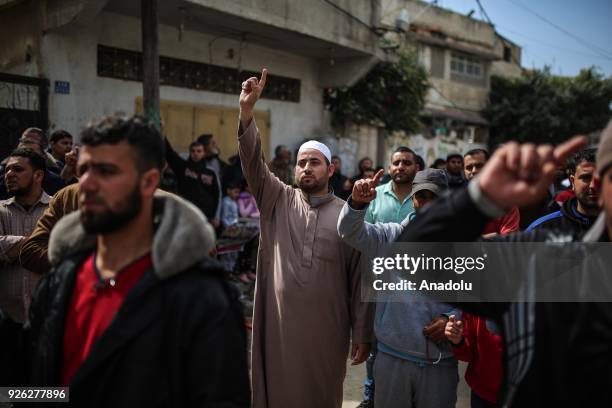 Palestinians attend a protest against U.S. President Donald Trumps announcement to recognize Jerusalem as the capital of Israel and plans to relocate...