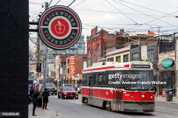 The TTC 501 Queen St. Streetcar passes the Brickworks Ciderhouse, February 28, 2018. For weekly new-business profile.