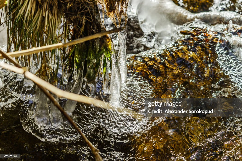 Abstract close-up view of ice in the river, winter in mountains, Germany