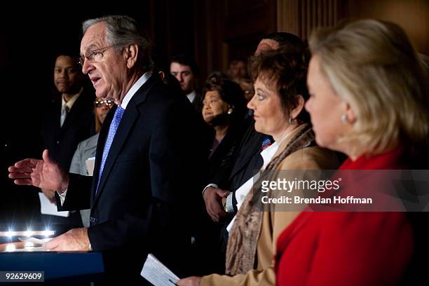 Sen. Tom Harkin speaks at a news conference on health insurance reform and its impact on small businesses with Rep. Debbie Halvorson and Sen. Mary...