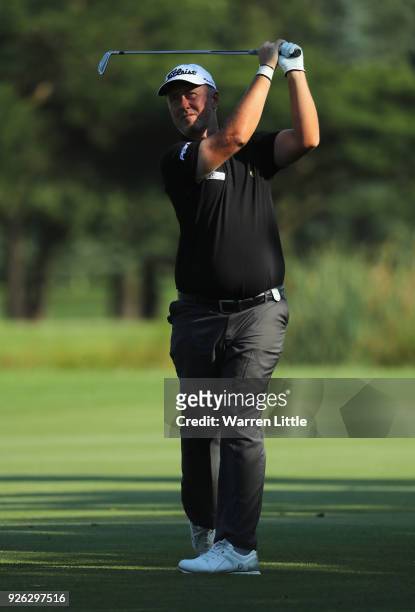 Mark Foster of England plays his second shot into the fourth green during the second round of the Tshwane Open at Pretoria Country Club on March 2,...
