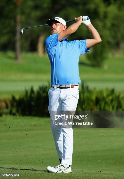 Jeff Winther of Denmark plays his second shot into the fourth green during the second round of the Tshwane Open at Pretoria Country Club on March 2,...