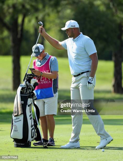 Jonathan Thomson of England prepares to play his second shot into the sixth green during the second round of the Tshwane Open at Pretoria Country...