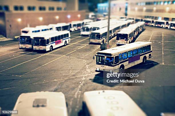 nyc mta bus pulling into bus depot in queens - bus station stock pictures, royalty-free photos & images