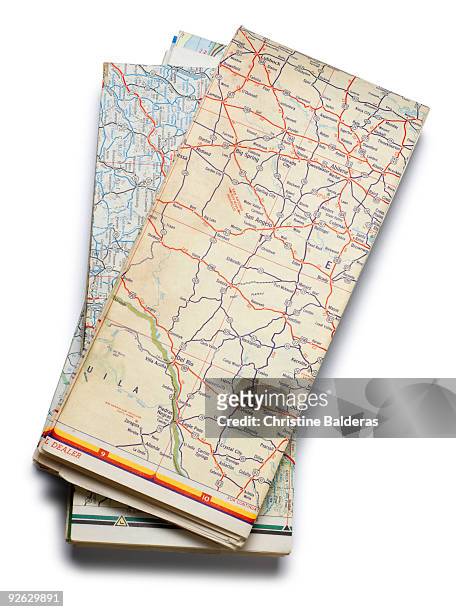 road maps - folded stock pictures, royalty-free photos & images