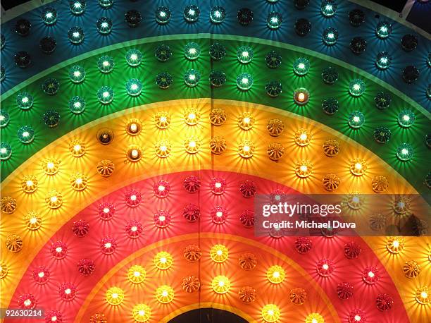 detail of a multi rainbow colored sign - amusement park sign stock pictures, royalty-free photos & images