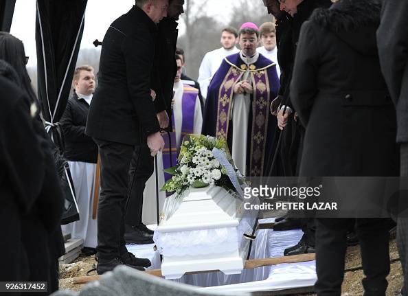 Clerics lead a religious service during the funeral of Martina... News ...