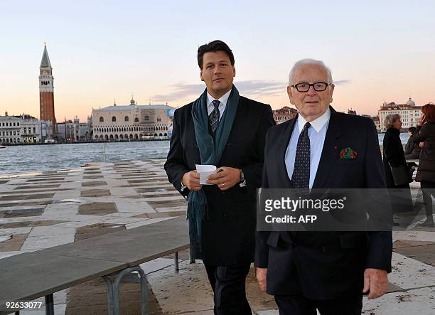 French fashion designer Pierre Cardin and his son Rodrigo arrive in Venice on November 3, 2009 to attend a concert on the occasion of the donation by...