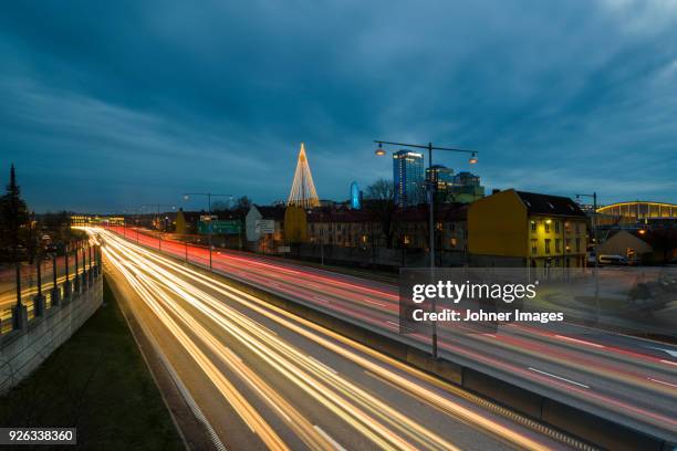 traffic light trails - national day in sweden 2017 stock pictures, royalty-free photos & images