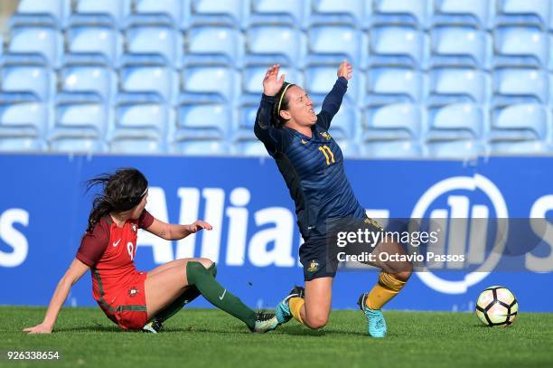 Ana Borges of Portugal competes for the ball with Lisa De Vanna of Australia during the Women's Algarve Cup Tournament match between Portugal and...
