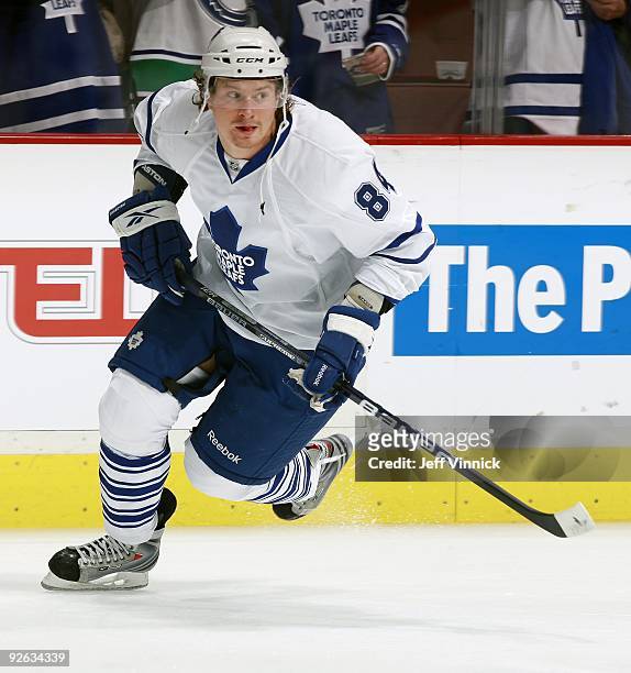 Mikhail Grabovski of the Toronto Maple Leafs skates up ice during their game against the Vancouver Canucks at General Motors Place on October 24,...